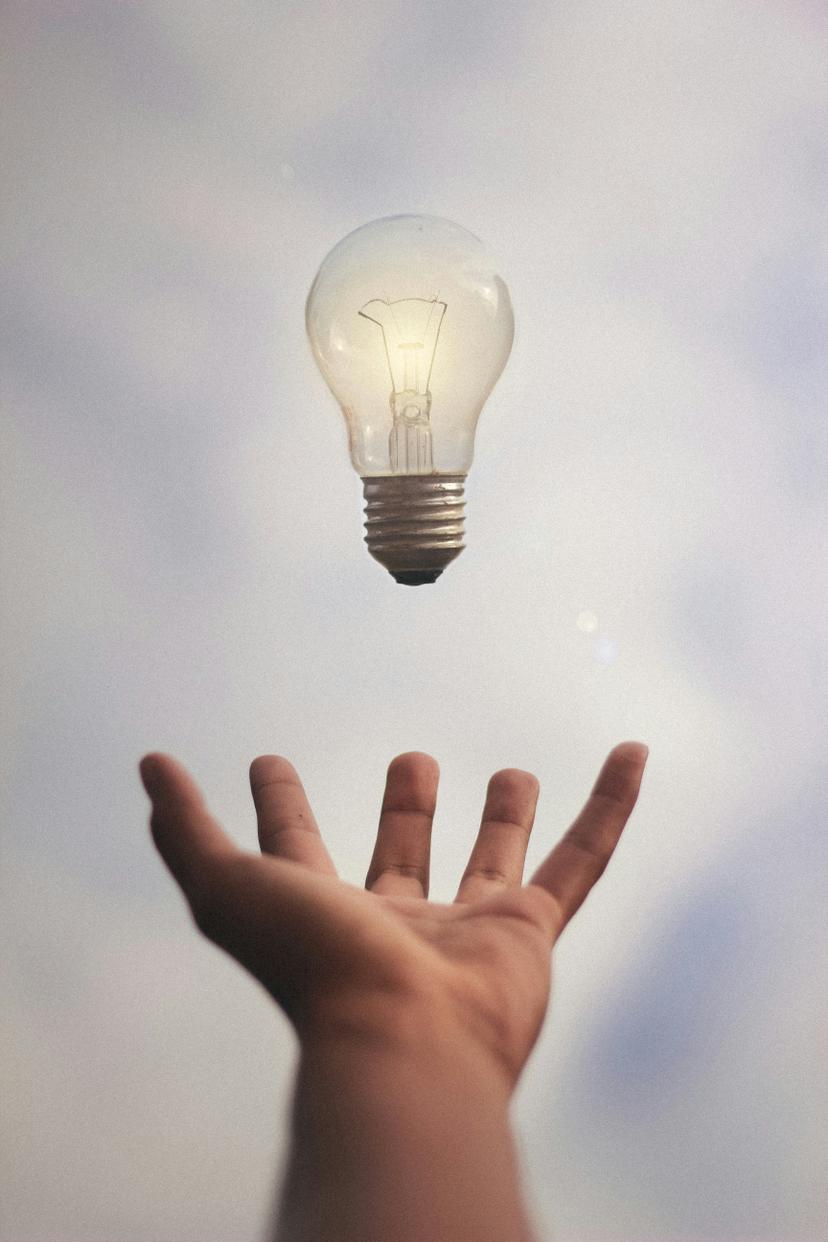 arm reaching for lightbulb